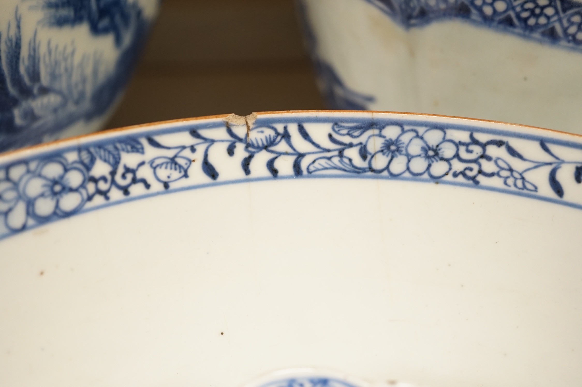 A selection of 18th century blue and white Chinese export bowls and dishes, largest 31cm diameter